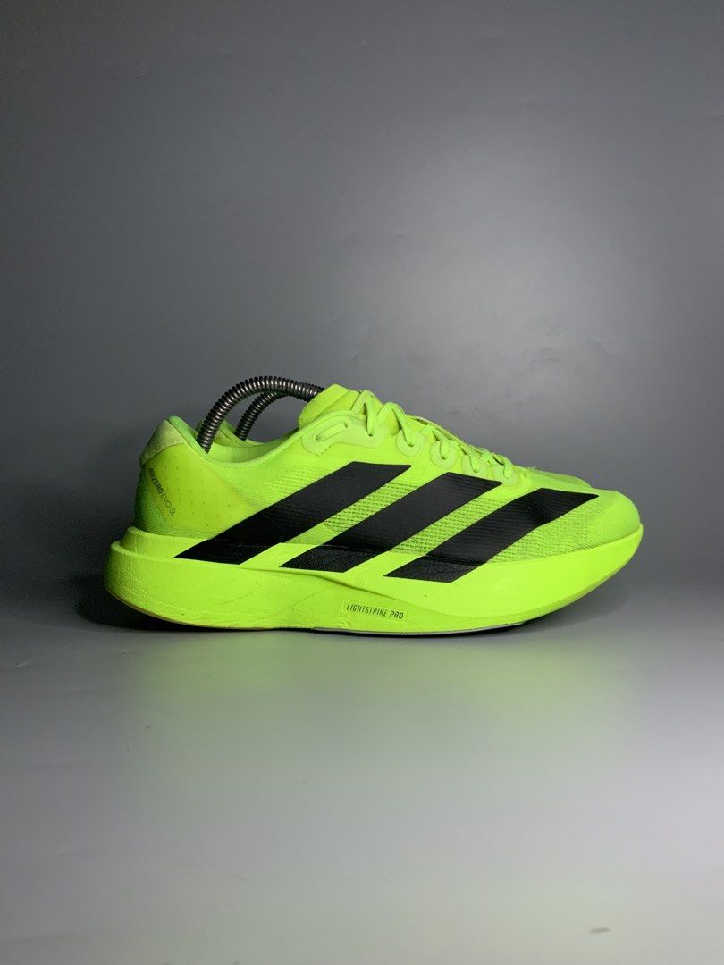Adidas Adizero Evo SL (Category: Sneakers) located in Cavite. Submitted by kalye_footwear (Listing ID 1468252369, Image 1). Description: - Brand: Adidas Adizero Evo SL - Color: Neon yellowgreen with black stripes - Us 8.5 , Euro 42 , Cm 26.5 - Cushioning: Lightstrike Pro midsole - Upper: Lightweight and breathable mesh - Use: Ideal for daily training and speed work - Sole: Traction rubber outsole.