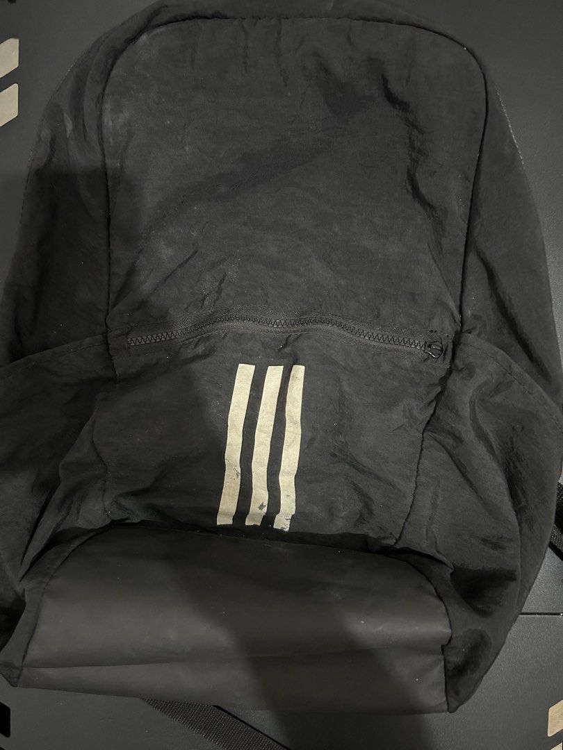 Adidas Black Backpack (Category: Backpacks) located in Mandaluyong City. Submitted by ncooooooo (Listing ID 1468228503, Image 1). Description: - Authentic black Adidas backpack - Iconic 3 white stripes on the front pocket (shows slight wear) Good condition, no major flaws except from slight fading on three stripes print and one missing zipp head. - Comfortable padded mesh shoulder straps - Durable black base panel for daily use - Front zippered p
