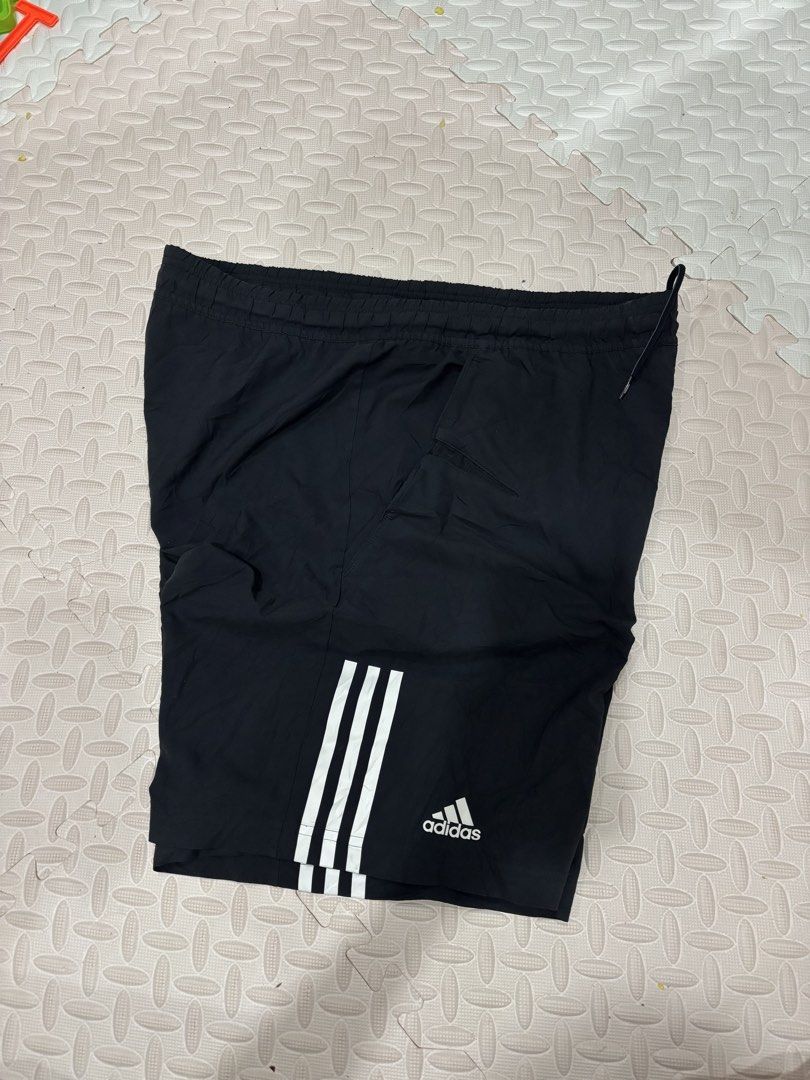 Adidas Climacool Black Shorts Size 105 (Category: Shorts) located in Manila. Submitted by noribrahim.20 (Listing ID 1468191944, Image 2). Description: - Brand: Adidas - Color: Classic black with white 3-stripe branding and front logo - Tech: Climacool fabric to keep you cool and dry - Fit: Elastic waistband with adjustable drawstring - Features: Two convenient side pockets - Size: 105 tag - Origin: Made in Thailand - Condition: Great for running,