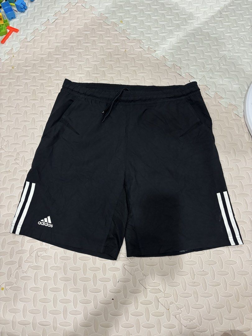 Adidas Climacool Black Shorts Size 105 (Category: Shorts) located in Manila. Submitted by noribrahim.20 (Listing ID 1468191944, Image 1). Description: - Brand: Adidas - Color: Classic black with white 3-stripe branding and front logo - Tech: Climacool fabric to keep you cool and dry - Fit: Elastic waistband with adjustable drawstring - Features: Two convenient side pockets - Size: 105 tag - Origin: Made in Thailand - Condition: Great for running,
