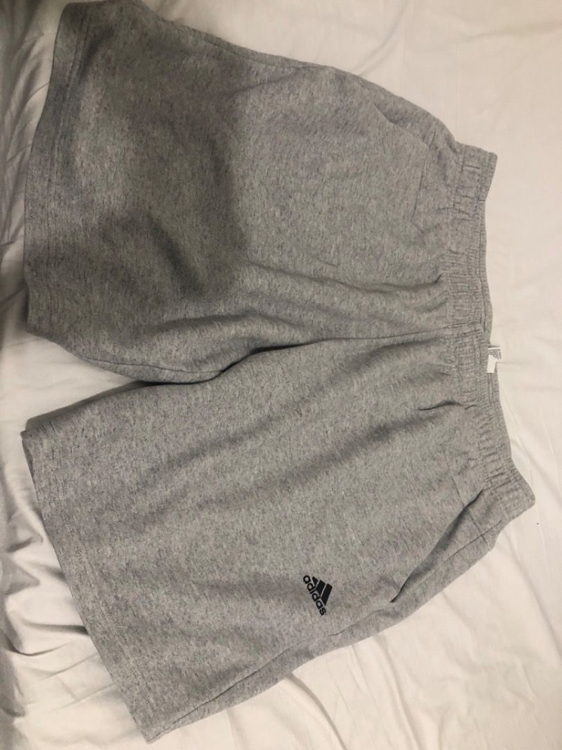 Adidas Essentials FeelComfy French Terry (Category: Joggers) located in Manila. Submitted by kissa.1890 (Listing ID 1468194081, Image 1). Description: - Brand: Adidas - Color: Grey Heather - Size: XL (Interior tag also shows 4XO and XL/TG) - Material: Soft cotton blend - Features: Comfortable elastic waistband - Origin: Made in Vietnam - Condition: Clean inside and out, great for gym or lounging.