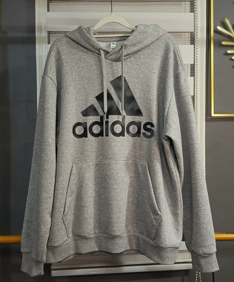 Adidas Hoodie (Category: Coats, Jackets and Outerwear) located in Bulacan. Submitted by clcclothing_shop (Listing ID 1468282954, Image 1). Description: Large on tag Dimes: Width 24 Length 29 good as new.