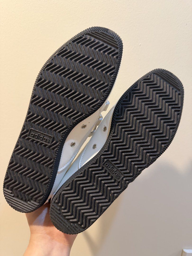 Adidas Jennie Shoes (Category: Sneakers) located in Manila. Submitted by anning03 (Listing ID 1468192089, Image 2). Description: - Brand: Adidas - Style: White leather sneakers with black stripes and contrast heel tab - Closure: Three hook-and-loop velcro straps - Outsole: Black zigzag patterned rubber - Size: US 6.5 | UK 5 | FR 38 - Condition: Brand new, never worn with pristine soles and crisp uppers.