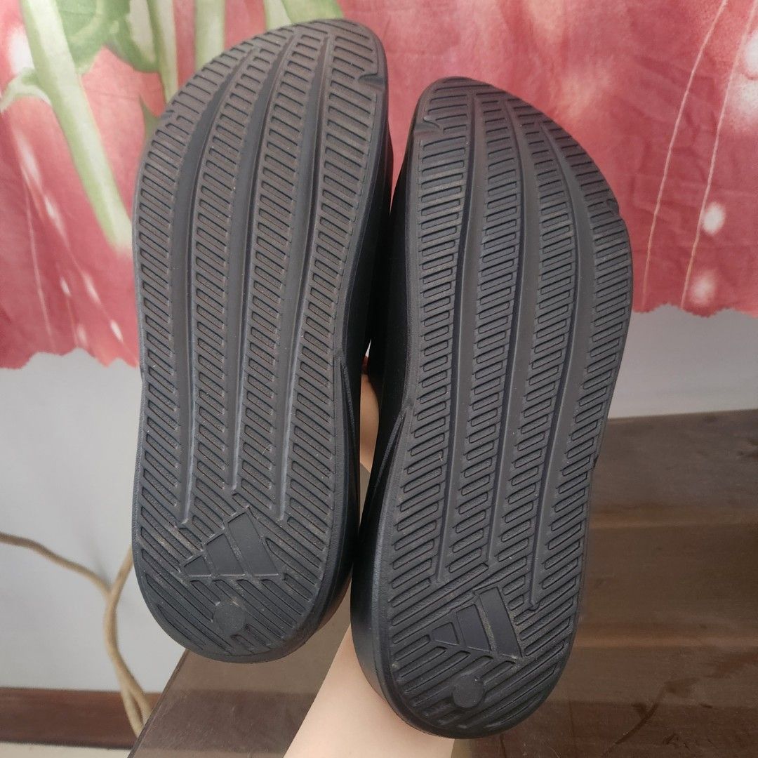 Adidas Lightshift Slides Black Size 9M (Category: Slippers & Slides) located in Manila. Submitted by shanmayeng (Listing ID 1468096076, Image 3). Description: - Brand: Adidas - Model: Lightshift Slides - Color: Black - Size: 9 US Men / 10 US Women (275 JP) - Condition: Brand new with original tags attached (no box) - Features: Super comfortable cushioning, textured footbed for grip, and iconic embossed three stripes.