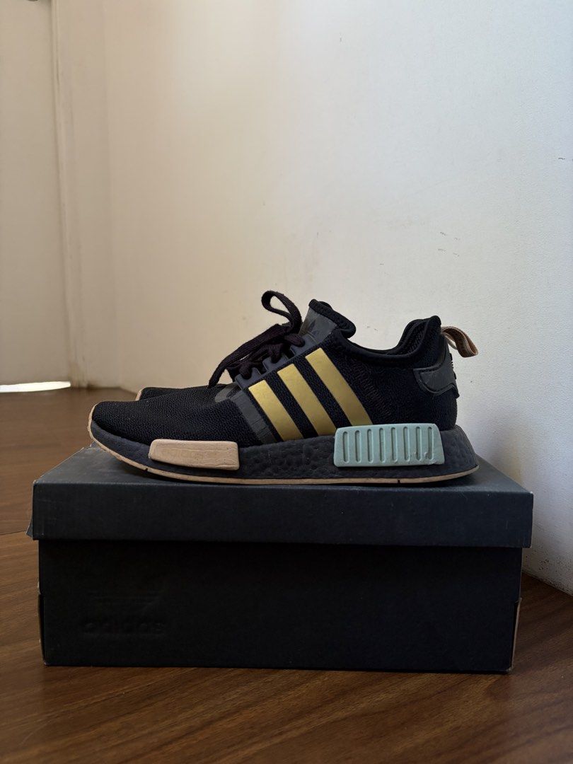 Adidas NMD R1 Womens (Category: Sneakers) located in Rizal. Submitted by pinatoi (Listing ID 1468067740, Image 3). Description: Adidas NMD R1 Womens Core Black / Metallic Gold / Mint Green / Pink Peach US 7.5 / 24.5 CM ORIGINAL, comes with box and tag Good condition except for minor flaws and signs of usage :) FOR SALE OR SWAP TO TRAIL RUNNING SHOES OR CYCLING SHOES Location: Upper Antipolo.