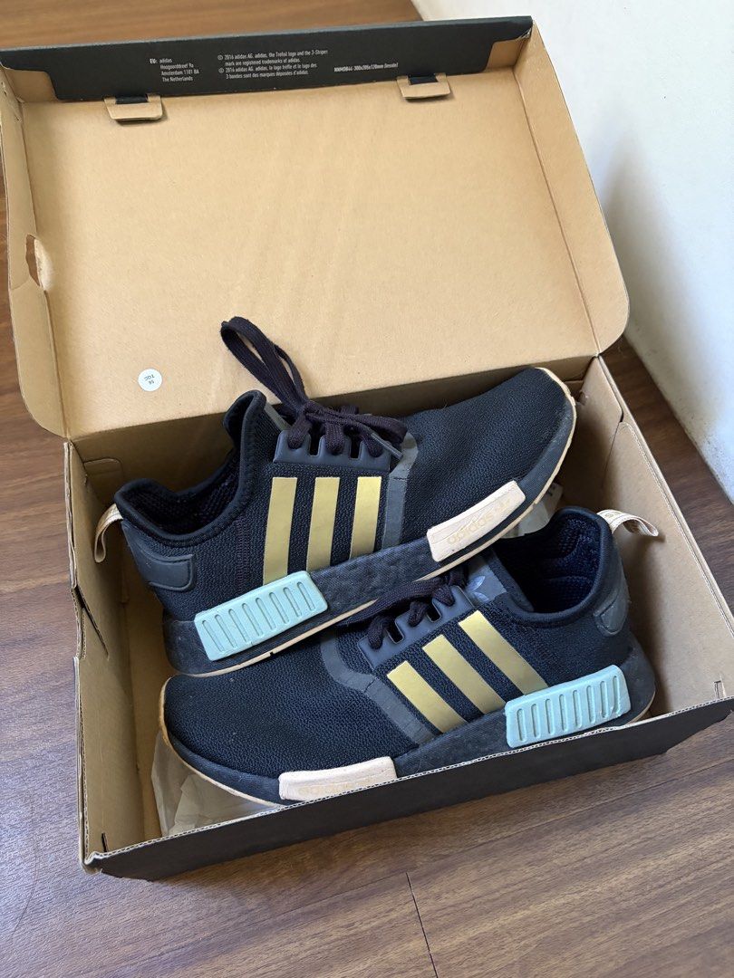 Adidas NMD R1 Womens (Category: Sneakers) located in Rizal. Submitted by pinatoi (Listing ID 1468067740, Image 1). Description: Adidas NMD R1 Womens Core Black / Metallic Gold / Mint Green / Pink Peach US 7.5 / 24.5 CM ORIGINAL, comes with box and tag Good condition except for minor flaws and signs of usage :) FOR SALE OR SWAP TO TRAIL RUNNING SHOES OR CYCLING SHOES Location: Upper Antipolo.