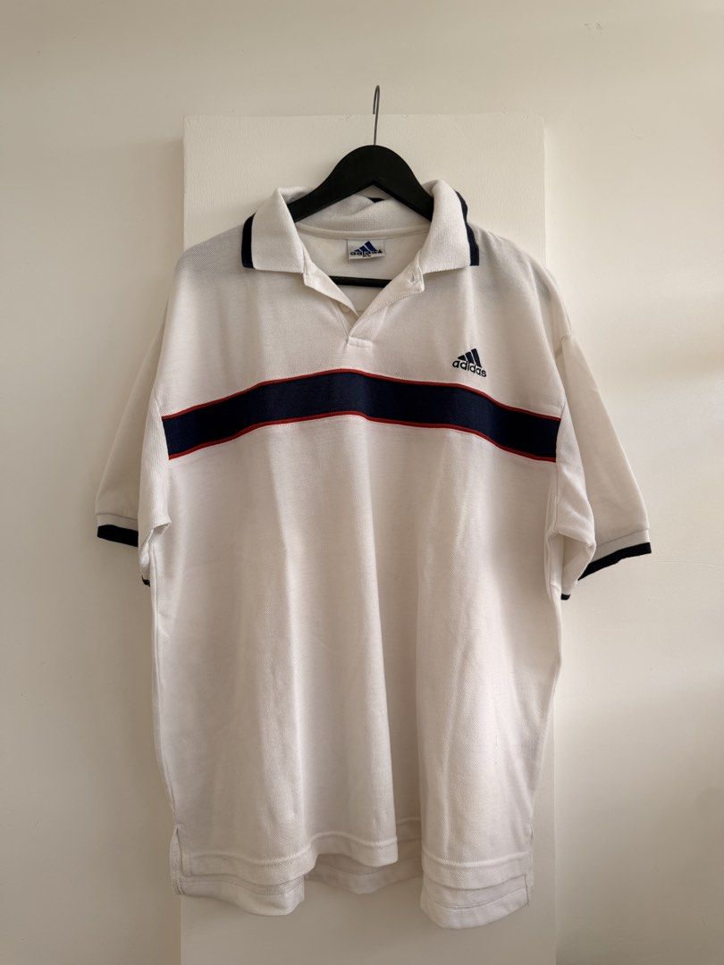 adidas polo (Category: Tshirts & Polo Shirts ) located in Cavite. Submitted by dalowf (Listing ID 1468165383, Image 1). Description: adidas polo 24 width 27 length himulmol yellow stain.