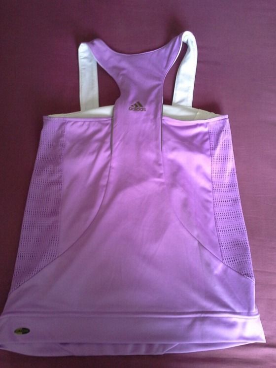 ADIDAS PURPLE ACTIVEWEAR TOP (Category: Sleeveless) located in Marikina City. Submitted by minimalistmanila (Listing ID 1468147356, Image 2). Description: Genuine Adidas from USA. Purple color, fits small to semi medium. Worth P3,000+. Unused but washed. Order now! .