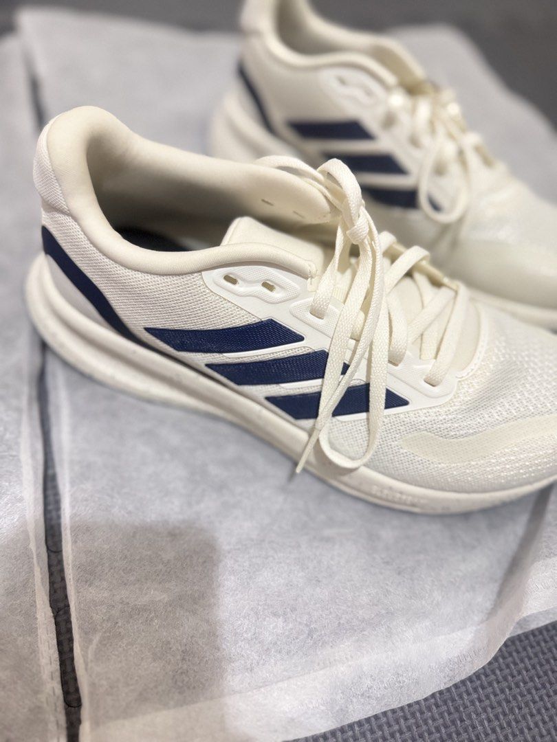 Adidas Run Falcon 5 (unisex) (Category: Sneakers) located in Manila. Submitted by jnakrsti (Listing ID 1468199740, Image 3). Description: Brand new Adidas Run Falcon 5 unisex running shoes in white and dark blue. Size EU 37 / UK 4 / US 6. Features mesh upper, OrthoLite cushioning, and a speckled midsole with pristine blue grip sole. Tag still attached, never worn. Perfect for daily wear and casual styling..