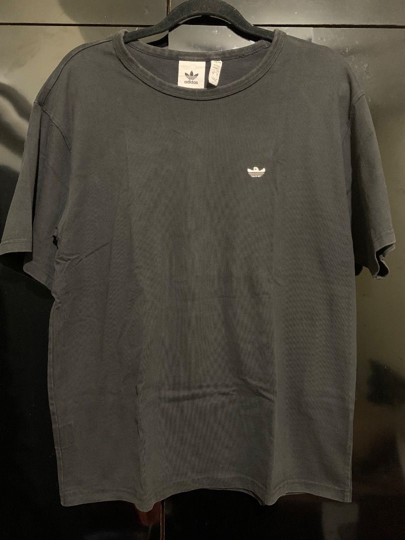 Adidas Shirt (Black) (Category: Tshirts & Polo Shirts ) located in Taguig. Submitted by reused.unused (Listing ID 1468206664, Image 1). Description: Adidas Shirt (Black) Embroidered Logo L on Tag 27in length (waist to hem) 9in length (sleeve) 21.5in width (shoulder) 21.5in width (pit to pit) Issue/s: signs of usage -refer to photos for actual condition -refer to close up photo for actual color -pre-loved item so signs of usage is expected -for se