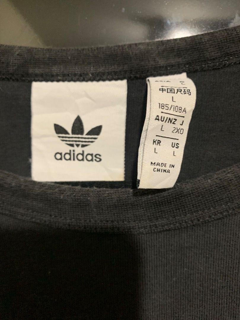 Adidas Shirt (Black) (Category: Tshirts & Polo Shirts ) located in Taguig. Submitted by reused.unused (Listing ID 1468206664, Image 3). Description: Adidas Shirt (Black) Embroidered Logo L on Tag 27in length (waist to hem) 9in length (sleeve) 21.5in width (shoulder) 21.5in width (pit to pit) Issue/s: signs of usage -refer to photos for actual condition -refer to close up photo for actual color -pre-loved item so signs of usage is expected -for se