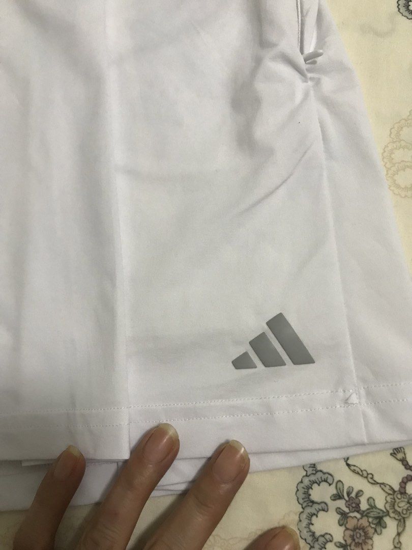 Adidas Tennis Skirt (Category: Activewear) located in Manila. Submitted by freshlemon58885 (Listing ID 1468096113, Image 2). Description: With Inner Cycling 2 side zipper pockets 1 zipper pocket at the back Rubberized Logo 3 Strips Medium on Tag to L .
