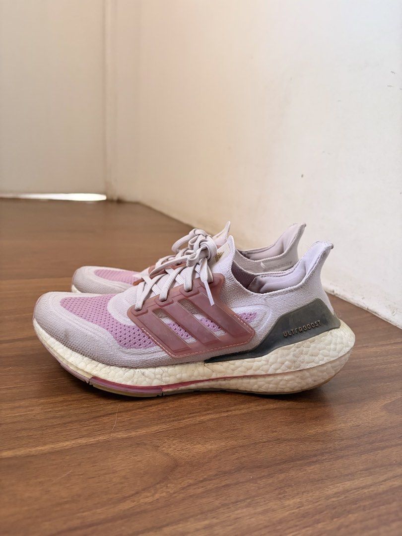 Adidas Ultraboost 21 Womens (Category: Sneakers) located in Rizal. Submitted by pinatoi (Listing ID 1468066988, Image 2). Description: Adidas Ultraboost 21 Womens Ice Purple / Cloud White / Rose To US 8.5 | 25.5 CM ORIGINAL, bought from Adidas Robinsons Antipolo for 9,500 PHP. Good condition, no flaws other than minimal signs of wear :) FOR SALE or SWAP to trail running shoes! - Material: Primeblue knit upper - Condition: Boost midsoles show mino