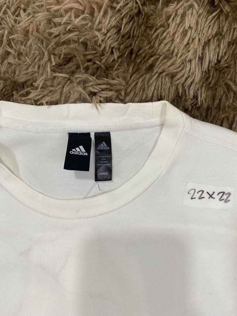 Adidas White Sweatshirt Long Sleeve Pullover (Category: Coats, Jackets and Outerwear) located in Cagayan de Oro. Submitted by sepamorash53558 (Listing ID 1468266413, Image 3). Description: - Brand: Adidas - Color: White - Size: A/M (165/88A) - Condition: Brand new with tag attached - Design: Long sleeves with ribbed cuffs and hem, stylish zip details on side seams and cuffs, and a small black Adidas logo on the lower front - Perfect for casual we
