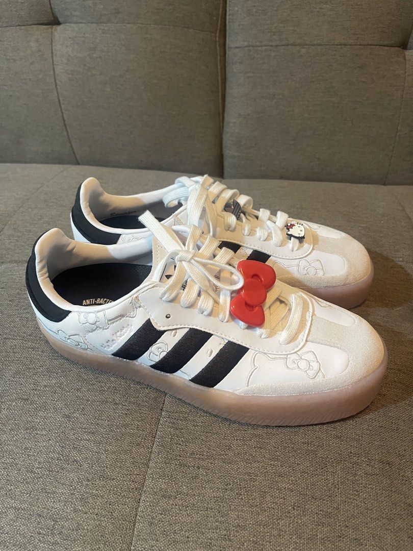 Adidas x Hello Kitty Sneakers (Category: Sneakers) located in Manila. Submitted by denyeiil (Listing ID 1468267377, Image 3). Description: - Brand/Model: Adidas x Kitty Sneakers - Size: EU 37 / UK 4 / US 6 - Color: White and black with translucent gum sole - Features: Cute embossed Kitty graphics, detachable red bow lace charm, and comfortable fit - Condition: Excellent, lightly used - Perfect for casual wear, streetwear, and collectors.