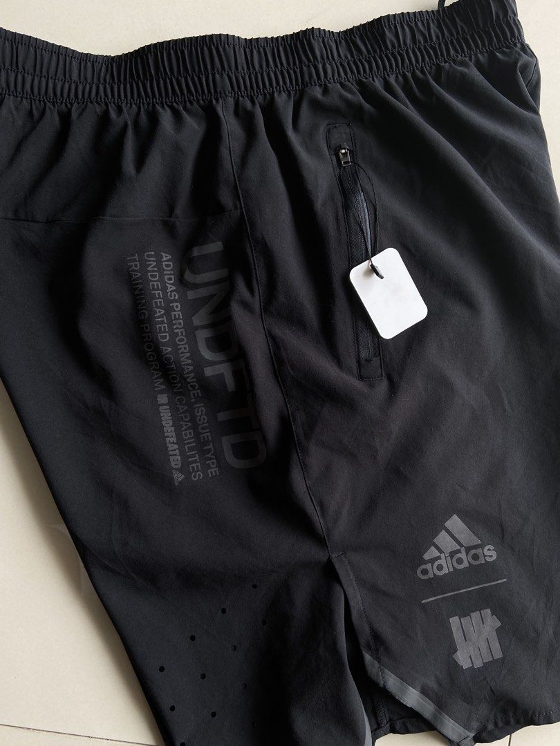 Adidas x Undefeated Shorts (Category: Shorts) located in Panabo. Submitted by thrifty.red (Listing ID 1468102970, Image 3). Description: Medium no issue cut washtag.