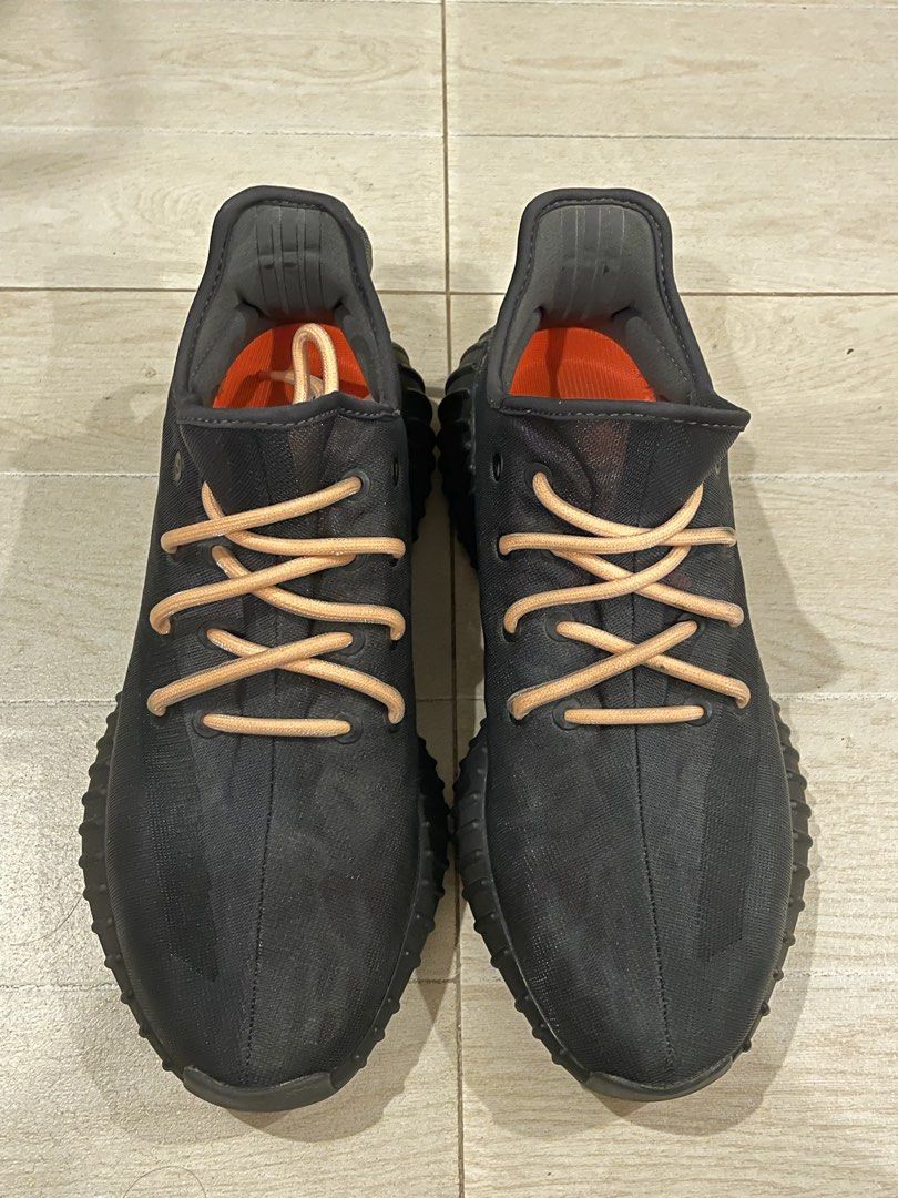 Adidas Yeezy Boost 350 V2 Black Orange (Category: Sneakers) located in San Miguel. Submitted by spiritsea710109 (Listing ID 1468203227, Image 1). Description: - Authentic Black Yeezy Boost 350 V2 sneakers - Features bright orange insoles and stylish beige rope laces - Ribbed black midsole with visible, comfortable Boost cushioning - Clean uppers and secure heel tabs.