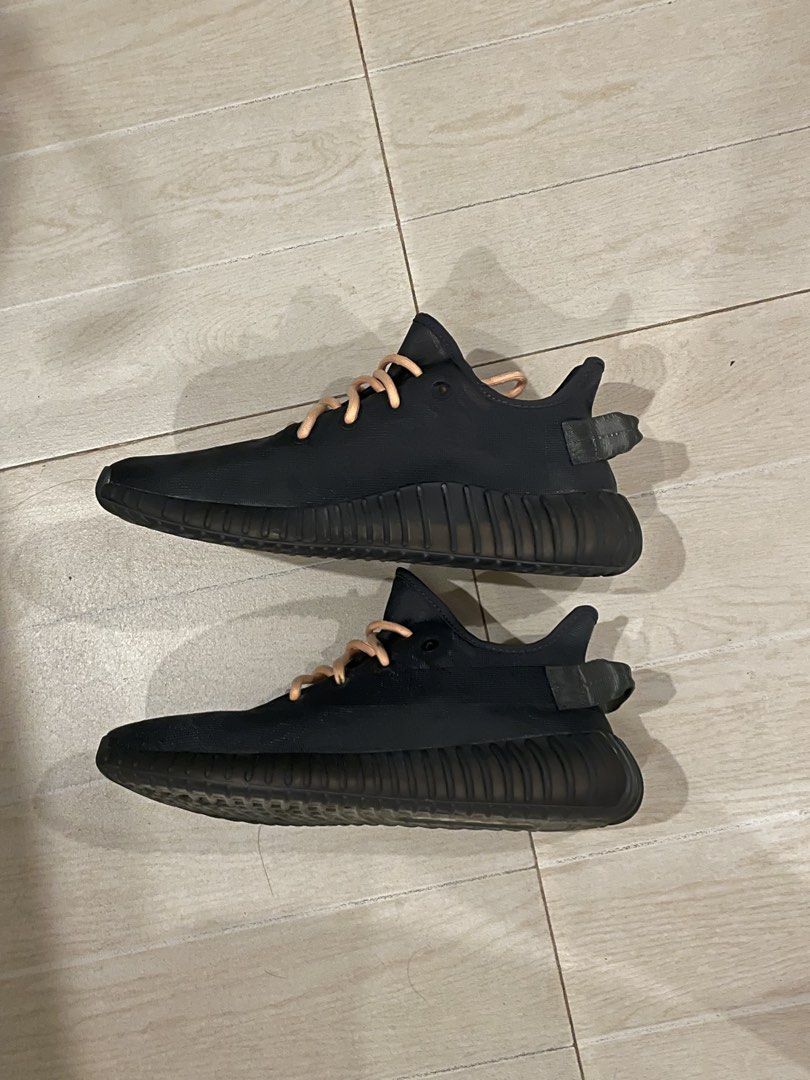 Adidas Yeezy Boost 350 V2 Black Orange (Category: Sneakers) located in San Miguel. Submitted by spiritsea710109 (Listing ID 1468203227, Image 3). Description: - Authentic Black Yeezy Boost 350 V2 sneakers - Features bright orange insoles and stylish beige rope laces - Ribbed black midsole with visible, comfortable Boost cushioning - Clean uppers and secure heel tabs.