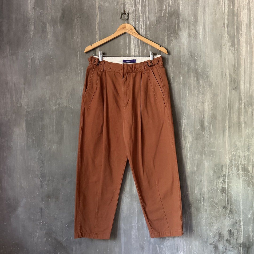 aftermaths Heritage Pleated Gurkha Pants (Category: Trousers) located in Puerto Princesa. Submitted by terdsthrift (Listing ID 1468256453, Image 1). Description: aftermaths Heritage Pleated Gurkha Pants Waist: 30 Length: 38 Thigh: 13.5 Hem: 8 In Excellent Condition / No Issue Color Rate: 10/10 - Brand: Aftermaths - Size: Small - Material: 100% cotton - Color: Deep rust-brown - Fit: Relaxed tapered leg - Features: Side adjuster buckles at waistban