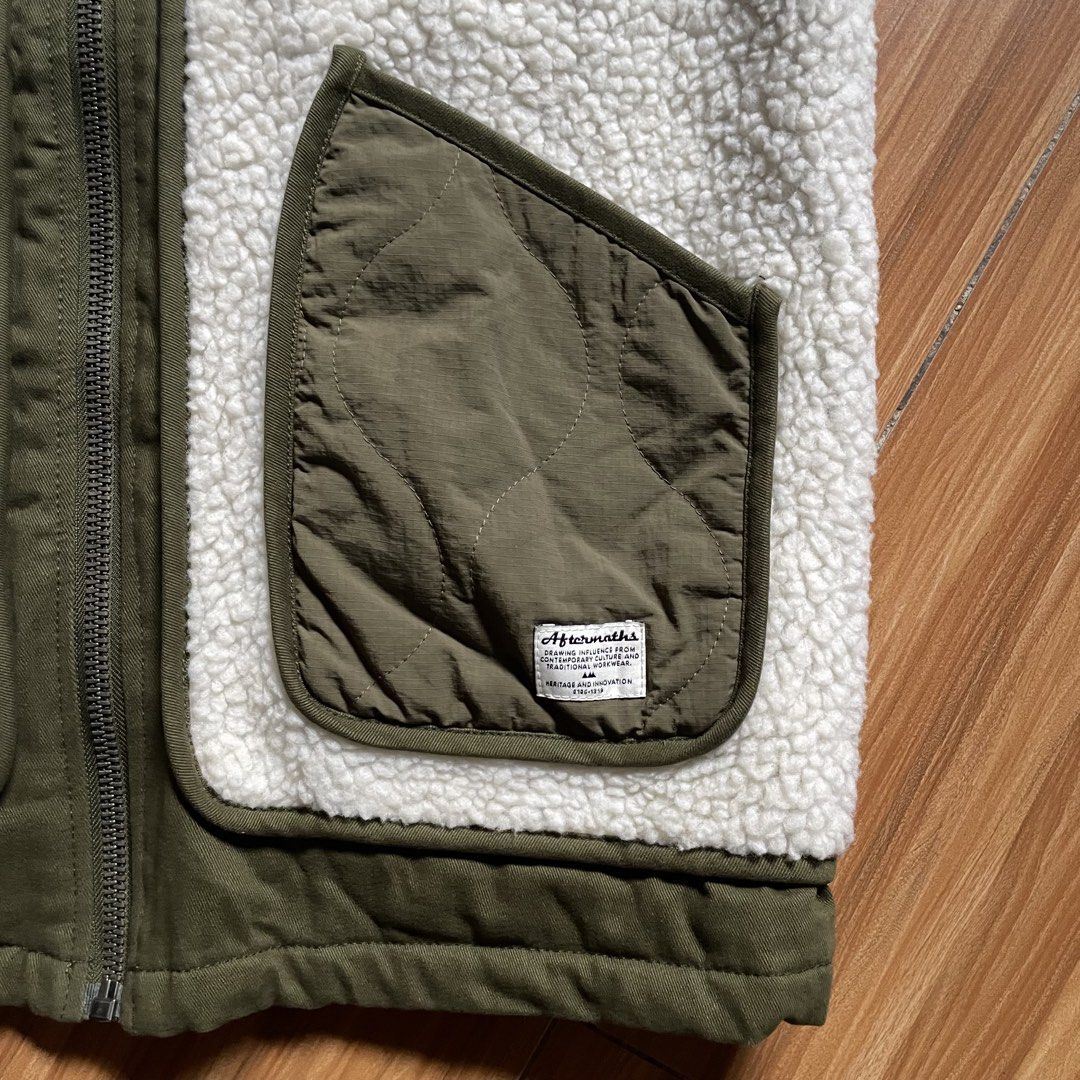 Aftermaths Sherpa Fleece Vest (Category: Coats, Jackets and Outerwear) located in General Mariano Alvarez. Submitted by 4117_thriftnthrive (Listing ID 1468233344, Image 3). Description: In excellent condition No flaws Size: M Measurements Width: 22” Length: 27”.
