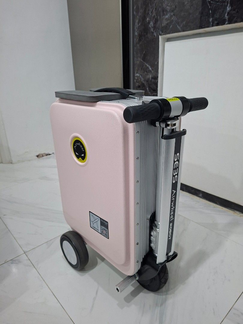 Airwheel S3ES Pink (Category: Luggage) located in Quezon City. Submitted by clairy_fairy (Listing ID 1468200993, Image 2). Description: Selling my Airwheel SE3S! ✨ Second-hand but barely used Still in great condition Stylish, convenient, and easy to use Message me if interested! 😊.