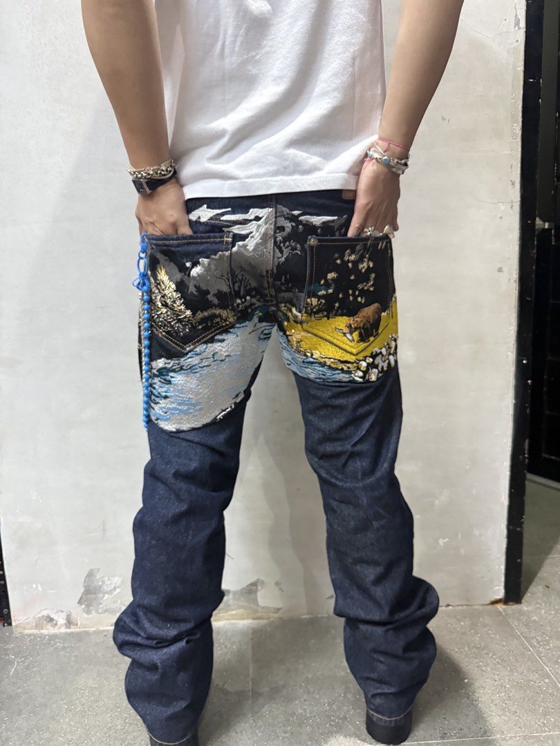 Akoo Japanese Embroidered Jeans (Category: Jeans) located in Manila. Submitted by allinthiswall (Listing ID 1468247211, Image 1). Description: vintage y2k #akoo “wild thing” nature scene embroidered denim jeans 🌲🐻🦌 featuring heavy, intricate landscape embroidery across the back and front pocket, complete with selvedge detailing and custom hardware,. size tag reads 34’ inch waist measures 36’ inch by 45’ inch overall length,. leg stacks fr.,. a