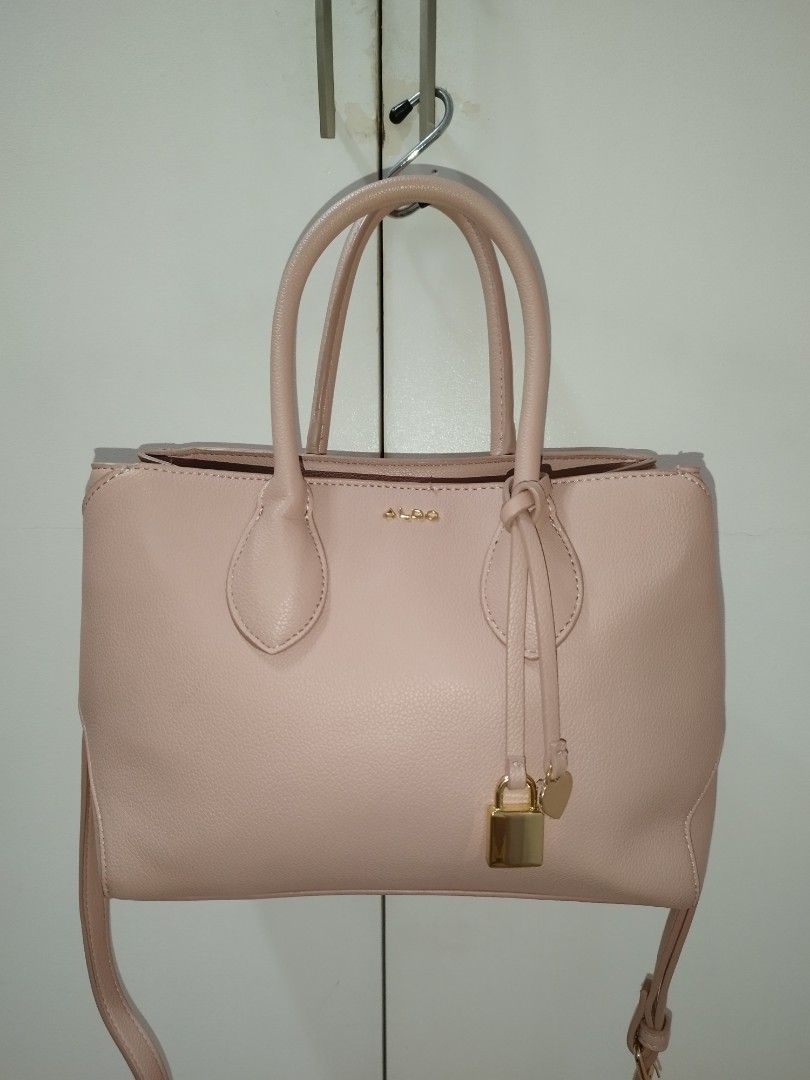 Aldo Top handle Satchel Bag (Category: Cross-body Bags) located in Makati City. Submitted by krishtyle (Listing ID 1468140403, Image 1). Description: Decluttering Personal Items Aldo Birin Top Handle Satchel Bag Issue: Upside down gold plated logo at the back (didn't notice immediately since the logo was located at the lower back of the bag) 📍Makati.