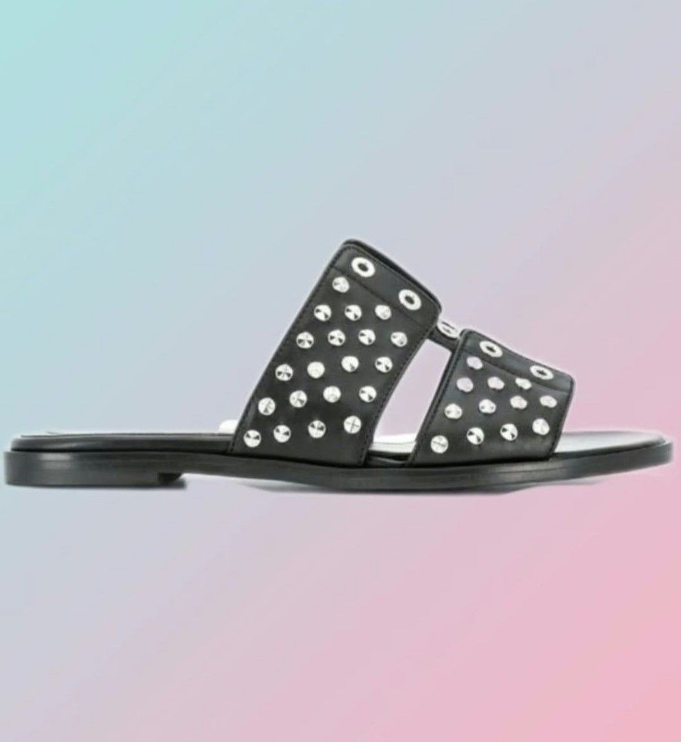 Alexander McQueen Studded Leather Flat Sandals Size 37 (Category: Flats & Sandals) located in Paranaque City. Submitted by calm_youngstore7 (Listing ID 1468073408, Image 3). Description: - Brand: Alexander McQueen - Style: Double strap flat sandals with slip-on design - Size: 37 (marked on sole and inner strap) - Color/Material: Black leather - Hardware: Silver-tone studs and eyelets - Perfect for stylish, comfortable daily wear Authentic Alexand