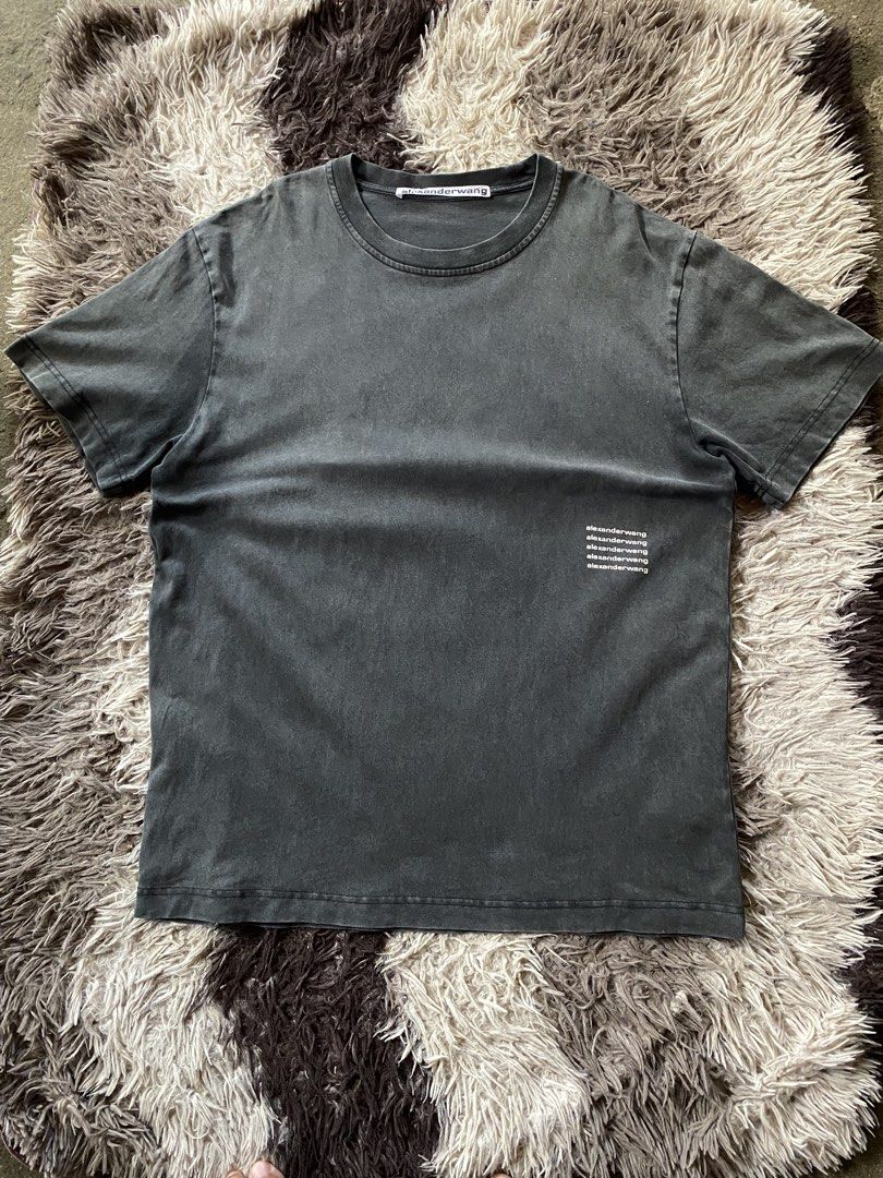 Alexander Wang Acid Wash Logo Tee (Category: Formal Shirts) located in Caloocan City. Submitted by remythrift (Listing ID 1468087563, Image 1). Description: - Brand: Alexander Wang - Size: L - Color/Finish: Acid wash grey with vintage faded look - Material: Soft cotton fabric - Design: Stacked white text logo near the lower hem - Details: Crew neck collar, standard short sleeves, and branded interior neck label/tag - Style: Easy streetwear piece 