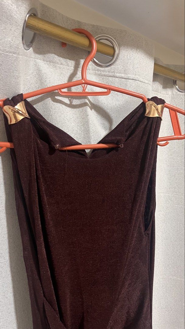 A-Line Sleeveless Dress (Category: Dresses) located in Santa Rita. Submitted by cnmgaux (Listing ID 1468142797, Image 2). Description: - Brand/Style: Lumalex sleeveless maxi dress - Color: Coffee Brown - Key Features: Unique metallic gold shoulder hardware and dramatic side drape tied at the waist - Material: Stretchy and comfortable fabric - Occasion: Ideal for formal events, parties, or weddings Used once Meet-up: Greenfields, Mandaluyong or SM