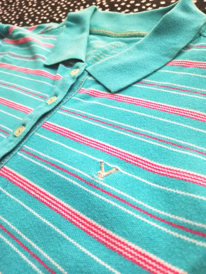 American Eagle Long Sleeve Striped Top (Category: Tshirts & Polo Shirts ) located in Makati City. Submitted by bananafishph (Listing ID 1468132887, Image 3). Description: - Material: Cotton and spandex blend - Fitted -Personally owned by seller and not from ukay. -Clean and washed - Slight flaw: Di sya kita, but If you raise the collar merong very faint yellowish spots (check last photo for reference) _____________ MOP: Gcash, BPI, Maya only. Shi