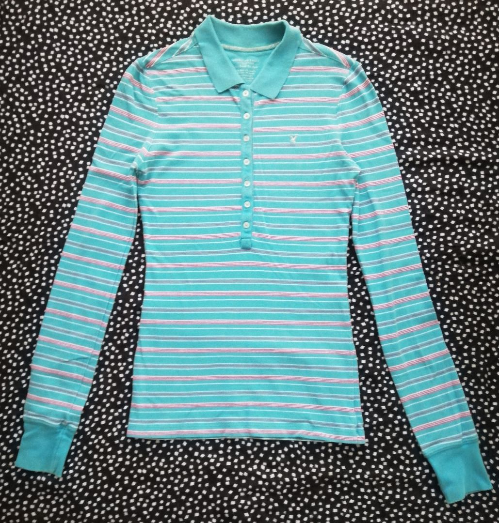 American Eagle Long Sleeve Striped Top (Category: Tshirts & Polo Shirts ) located in Makati City. Submitted by bananafishph (Listing ID 1468132887, Image 1). Description: - Material: Cotton and spandex blend - Fitted -Personally owned by seller and not from ukay. -Clean and washed - Slight flaw: Di sya kita, but If you raise the collar merong very faint yellowish spots (check last photo for reference) _____________ MOP: Gcash, BPI, Maya only. Shi