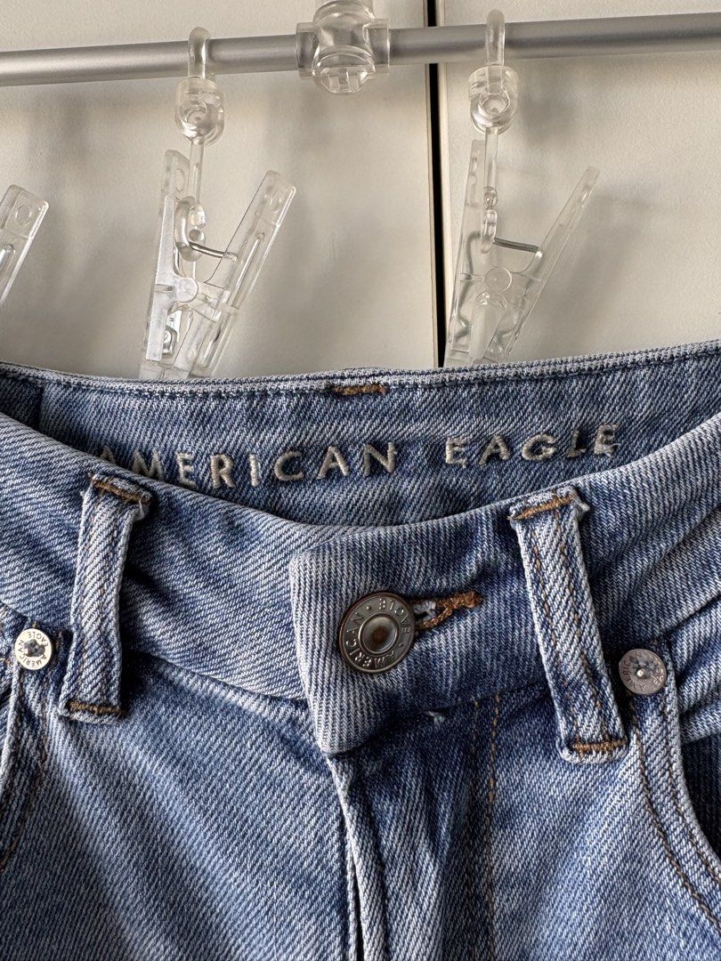 American Eagle Mom Jeans (Category: Jeans) located in Quezon City. Submitted by misserika (Listing ID 1468065466, Image 3). Description: - Brand: American Eagle - Style: High-waisted straight leg mom jeans - Wash: Light wash denim - Features: Classic five-pocket styling, metal button closure, branded rivets, and back leather patch - Condition: Excellent, clean, no tears or stains Bought in the US, used a couple times. Fits 26-27 inch waist, 37-38