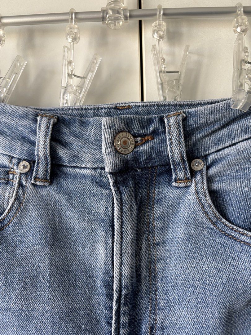 American Eagle Mom Jeans (Category: Jeans) located in Quezon City. Submitted by misserika (Listing ID 1468065466, Image 2). Description: - Brand: American Eagle - Style: High-waisted straight leg mom jeans - Wash: Light wash denim - Features: Classic five-pocket styling, metal button closure, branded rivets, and back leather patch - Condition: Excellent, clean, no tears or stains Bought in the US, used a couple times. Fits 26-27 inch waist, 37-38