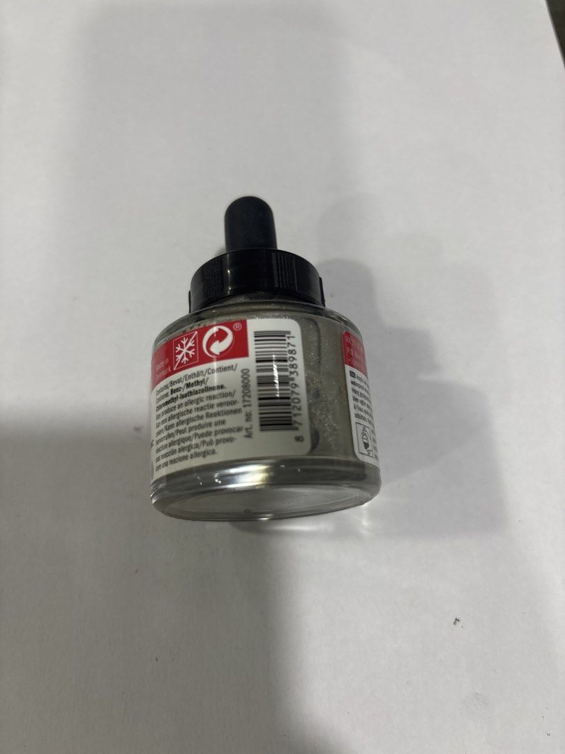Amsterdam Acrylic Ink 800 Silver 30ml (Category: Craft Supplies & Tools) located in Mandaluyong City. Submitted by clothescarousel (Listing ID 1468230057, Image 2). Description: Amsterdam acrylic ink in silver, shade number 800. Glass bottle holds 30ml or 1.0 fl.oz. Includes dropper cap for easy application. Great for calligraphy, airbrushing, or general painting work. Full bottle, unopened and unused..