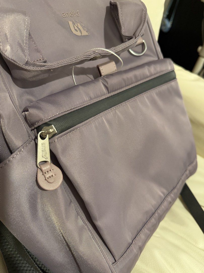 Anello Expand Backpack Purple (Category: Backpacks) located in Manila. Submitted by anning03 (Listing ID 1468192087, Image 3). Description: - Brand: Anello Expand Backpack - Color: Purple (with tag still attached on strap) - Material: Lightweight and durable nylon - Compartments: Spacious main compartment with a convenient zippered front pocket - Features: Dual top carry handles - Condition: Brand new with tags - Ideal for: School, work, or every