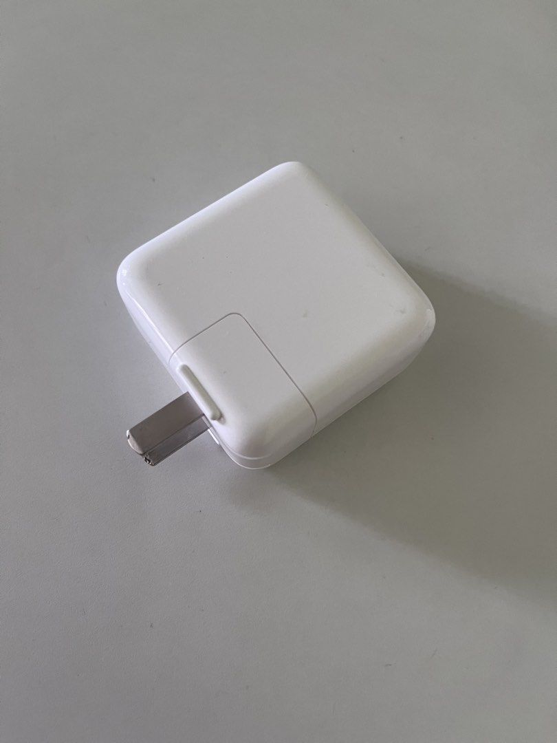 Apple 35W Dual USB-C Port Power Adapter (Category: Chargers & Cables) located in Pasig City. Submitted by instawardrobe (Listing ID 1468100591, Image 2). Description: - Authentic Apple 35W dual USB-C power adapter (Model MW2K3CH/A) - Charge two devices simultaneously with ease - Compact design featuring convenient fold-down prongs for travel - Barely used and in perfect working condition - Comes with the original box included.