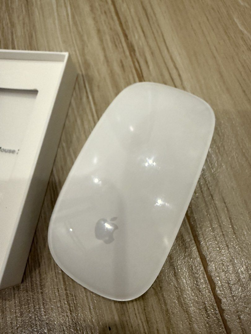 Apple Magic Mouse 2 (Category: Mouse & Mousepads) located in Bacoor. Submitted by cts217 (Listing ID 1468181195, Image 2). Description: - Authentic Apple Magic Mouse 2 (Model: A1657) - Sleek, minimalist white design with smooth continuous surface - Wireless and rechargeable battery (no disposable batteries needed) - Multi-Touch surface allows simple gestures like swiping and scrolling - Includes original retail box - Compatible with Bluetooth-ena