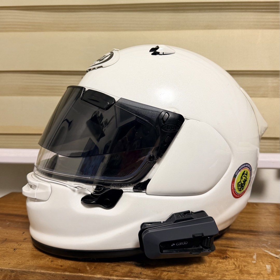 Arai Helmet with Cardo Packtalk Edge (Bundle!) (Category: Headphones & Headsets) located in Marikina City. Submitted by meandmyprelovedstuff (Listing ID 1468212551, Image 1). Description: ARAI ASTRO-GX Snell Certified With Cardo Packtalk Edge Size Medium or 57-58 cm Bought in 2023 Box not guaranteed (hahanapin pa) - Color/Finish: Gloss white - Visor: Tinted - Comms: Cardo bluetooth unit mounted - Accessories: Rear spoiler attachment and small com