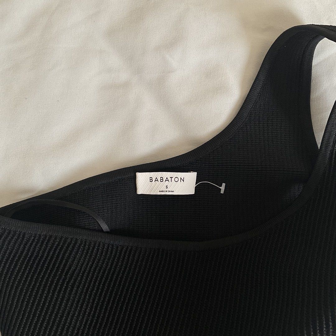 Aritzia Sculptknit One-Shoulder Top (Category: Sleeveless) located in Quezon City. Submitted by declutter.chek (Listing ID 1468136042, Image 3). Description: - Brand: Aritzia Babaton - Style: One-shoulder crop top with modern asymmetrical cut - Color: Black - Size: S - Material: Stretch knit - Condition: Removed the tags but never used. Comes in original packaging - RFS: not my style.