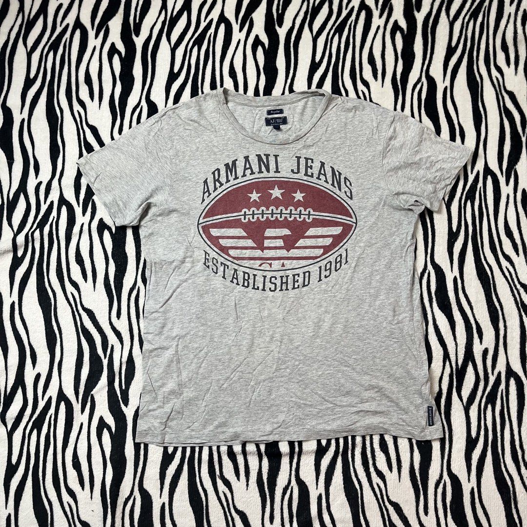 Armani jeans tshirt (Category: Tshirts & Polo Shirts ) located in Manila. Submitted by royaldripmanila (Listing ID 1468279832, Image 1). Description: No issue W21 L26.5.