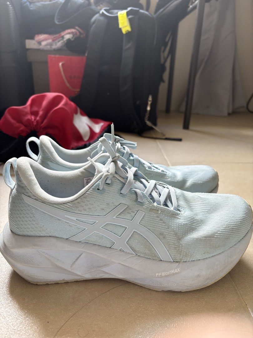 ASICS Novablast 5 light blue size 9.5 US (Category: Sneakers) located in Manila. Submitted by loislane112233 (Listing ID 1468071387, Image 2). Description: - Brand: ASICS Novablast - Color: Light blue - Size: 9.5 US / 41.5 EU / 26.0 cm - Cushioning: FF Blast Max in soles for maximum comfort - Material: Breathable mesh upper with standard lace-up closure - Condition: Gentle wear on outsoles and midsoles, with light dirt marks on the fabric upper; 