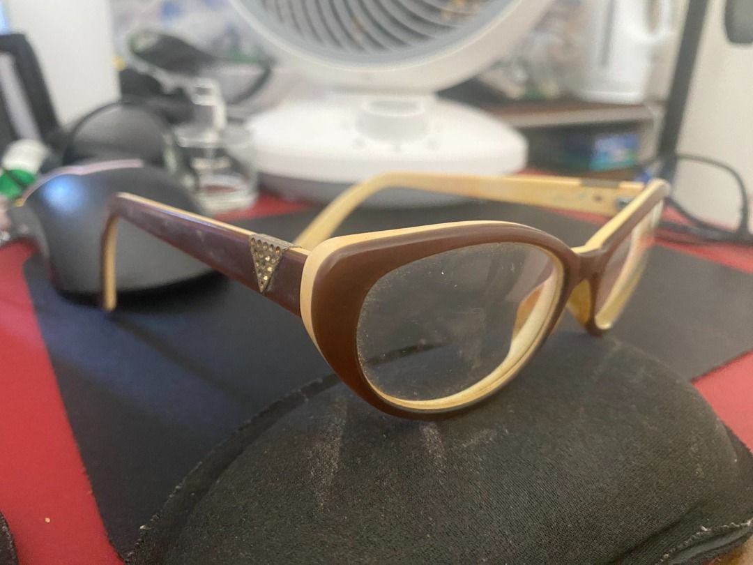 Assorted Eyeglass Frames Lot DKNY and Designer Styles (Category: Sunglasses & Eyewear) located in Muntinlupa City. Submitted by chubby_daddy82 (Listing ID 1468065717, Image 3). Description: - Set of 4 versatile eyeglass frames in different shapes and colors - Includes: Red and clear frame, brown rounded frame, rimless pair, and a red DKNY branded frame - Ideal for swapping out with your own prescription lenses - Frames only, no prescription lense