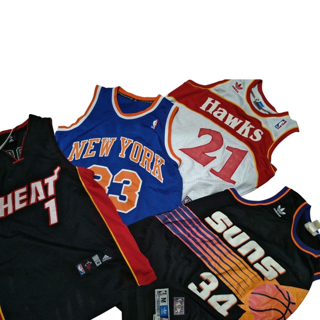 Assorted NBA Basketball Jerseys Adidas & Mitchell & Ness (Category: Activewear) located in Tagum. Submitted by Villanuevarex2795 (Listing ID 1468105434, Image 1). Description: - Bundle of 4 classic NBA basketball jerseys - Miami Heat #1 (Black) - New York Knicks #23 (Blue) - Atlanta Hawks #21 (White & Red) - Phoenix Suns Charles Barkley #34 Hardwood Classics (Black) - Features high-quality stitched numbers and lettering - Sizes vary across the se