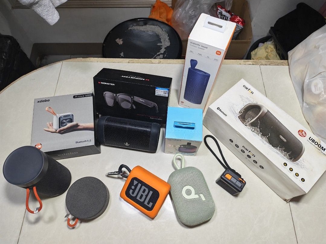 Assorted Portable Bluetooth Speakers and Audio Gear Lot (Category: Soundbars, Speakers & Amplifiers) located in Makati City. Submitted by boybenta21 (Listing ID 1468241597, Image 1). Description: - Audio gadgets and portable speakers available - Trusted brands: JBL, EarFun, Xiaomi, XDOBO, and Monster,soundcore - Includes wireless speakers, smart glasses, and original boxes - Perfect for music lovers and everyday use - Available as a bundle or sol