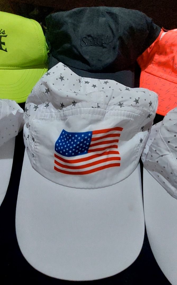 Assorted Sprints Running Caps and Visors (Category: Caps & Hats) located in Legazpi City. Submitted by street_uniform (Listing ID 1468240848, Image 3). Description: - 180 each - Brand: Sprints (Running Caps and Visors) - Available Colors/Designs: Neon yellow, black, bright pink, multiple white designs, American flag print, and running cheetah graphics - Features: Lightweight, breathable fabric with perforation patterns - Closure: Adjustable strap