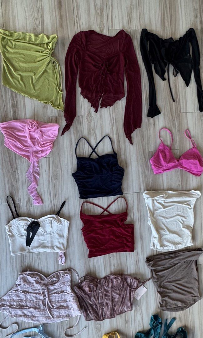 Assorted Tops and Bikinis Bundle (Category: Blouses) located in Makati City. Submitted by declutter_forsale (Listing ID 1468190394, Image 1). Description: BUNDLE Take all ₱1000 - Closet clear-out sale: Tops and bikini sets available - Styles: Strapless tubes, crop tops, lace corsets, and matching swimwear - Colors: Black, white, red, bright pink, lime green, and mustard yellow - Condition: Great mix, several pieces still have tags attached (BNWT)