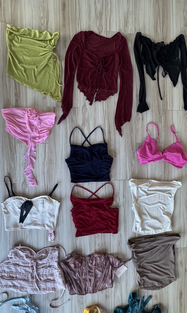 Assorted Tops and Bikinis Bundle (Category: Blouses) located in Makati City. Submitted by declutter_forsale (Listing ID 1468190394, Image 2). Description: BUNDLE Take all ₱1000 - Closet clear-out sale: Tops and bikini sets available - Styles: Strapless tubes, crop tops, lace corsets, and matching swimwear - Colors: Black, white, red, bright pink, lime green, and mustard yellow - Condition: Great mix, several pieces still have tags attached (BNWT)