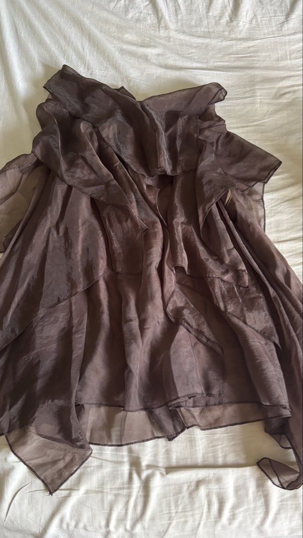 Assymetrical Ruffled Blouse Cape Top (Category: Blouses) located in Binan City. Submitted by myprelovedhaul (Listing ID 1468069487, Image 3). Description: This item appears to be a coffee brown or espresso sheer asymmetrical ruffle blouse or cape top (such as the Trendyol Asymmetrical Blouse or similar flowy mesh/chiffon styles from brands like SHEIN and Soly Hux).