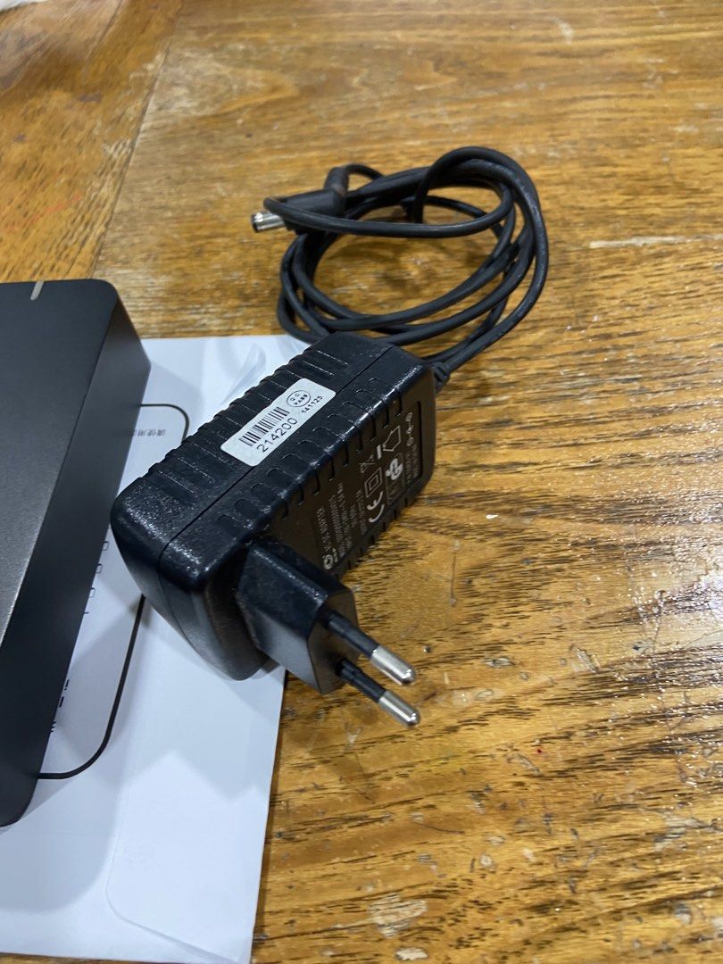 Auralic Aries Mini Wireless Streaming Node (Category: Soundbars, Speakers & Amplifiers) located in Singapore. Submitted by speakerphone51 (Listing ID 1468088950, Image 4). Description: - Model: Auralic Aries Mini (Black) - Condition: Fully functional, ready for your audio setup - Included: Original power adapter with European plug - Connectivity & Outputs: Ethernet port, 2x USB ports, optical out, coaxial out, and RCA stereo outputs - Verificatio